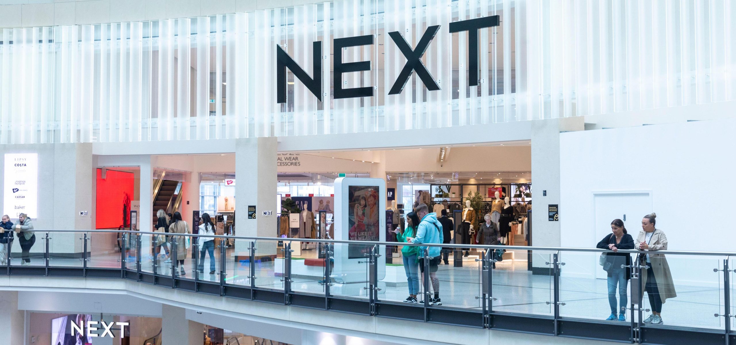 Next has been ordered to match the pay of its retail staff to those who work in its warehouses